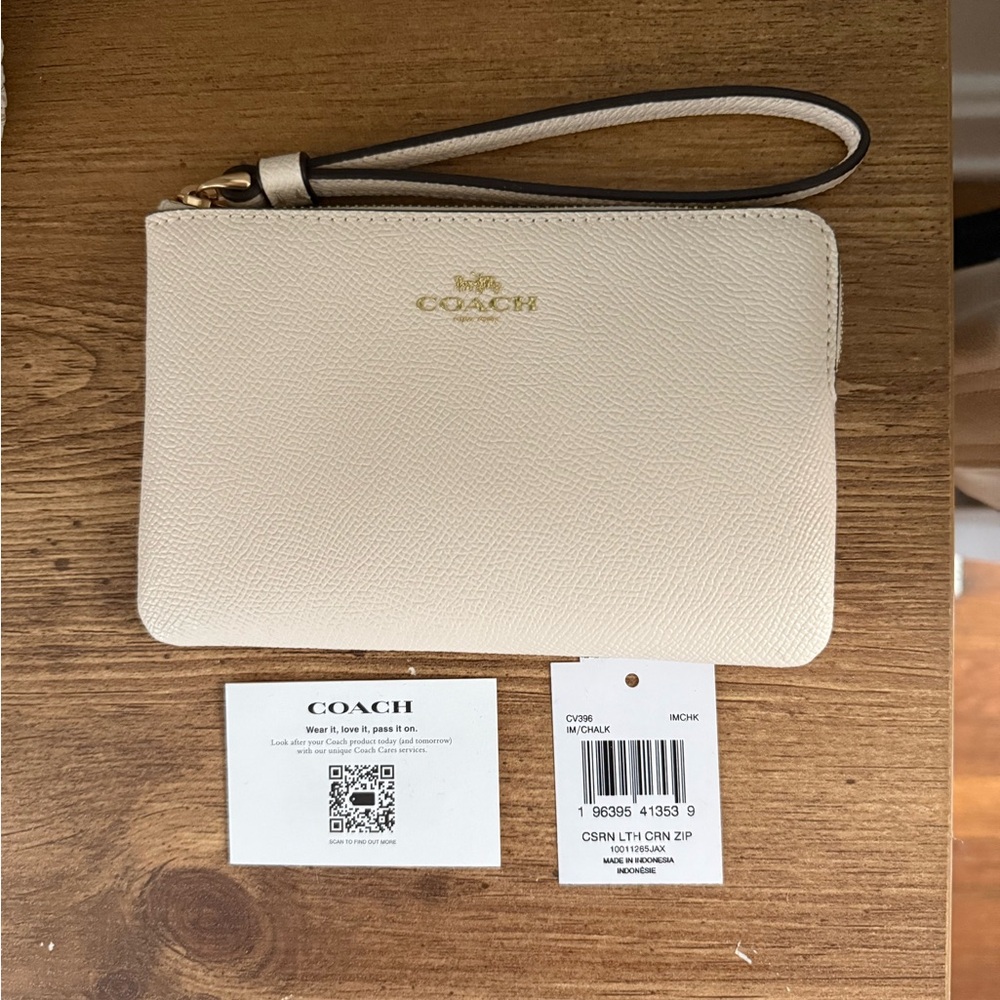 Coach Ivory Wristlet with Gold Accents